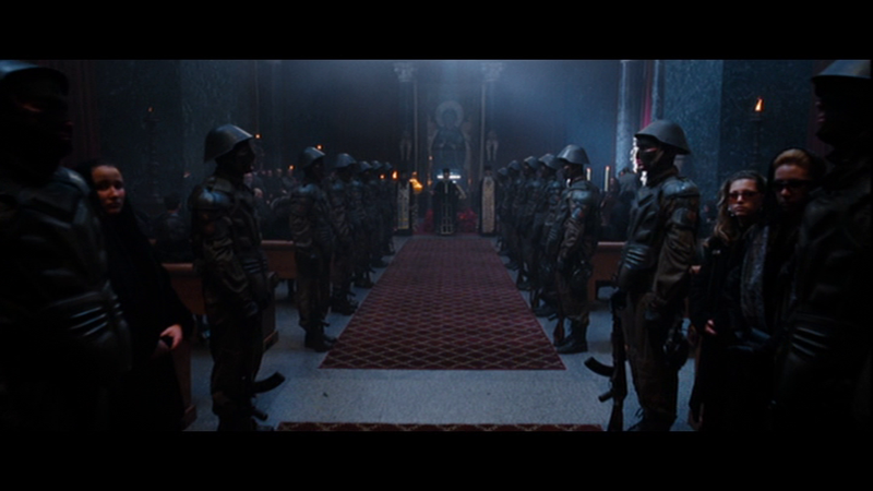 Is this a funeral or a cult meeting? Whats with those helmets?